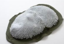 Self-forming structures by 3D printing on pre-stretched fabric